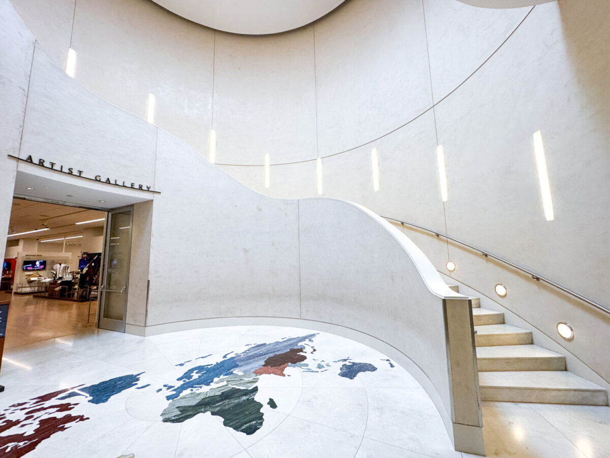 Stairway leading up to the 2nd floor of a museum 