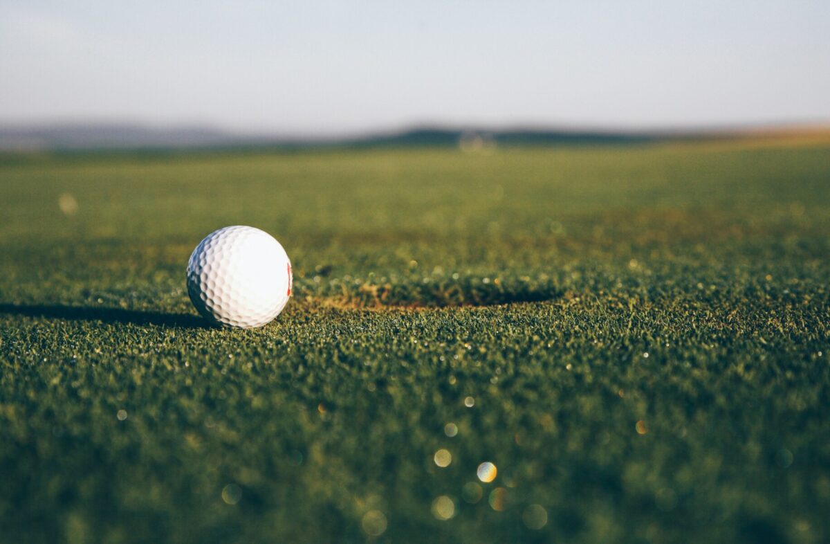 Golf ball resting on the green at a Scottsdale golf course in Arizona.