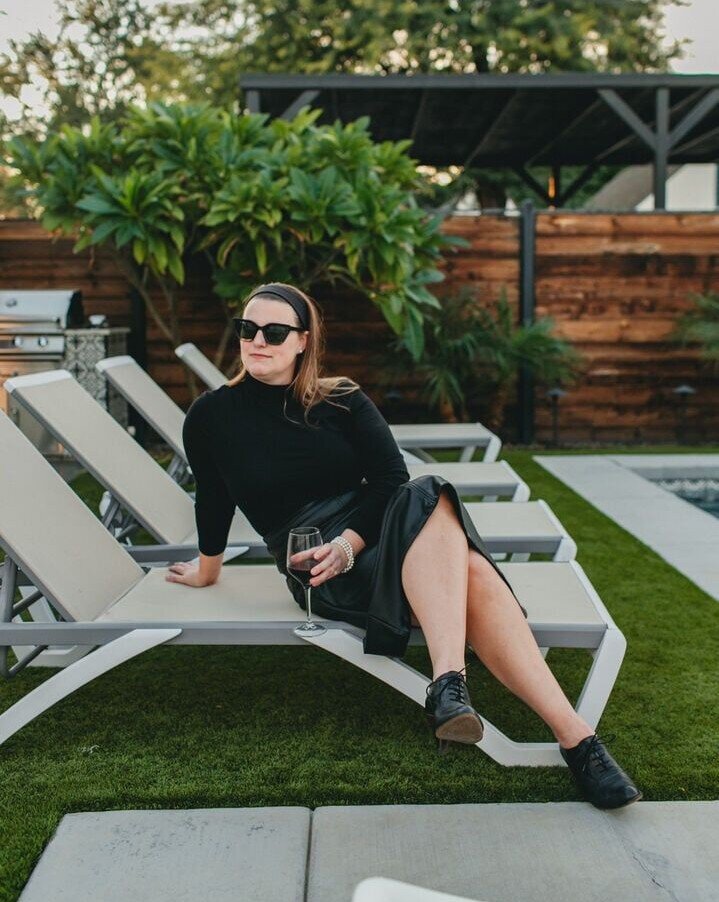 woman sipping wine